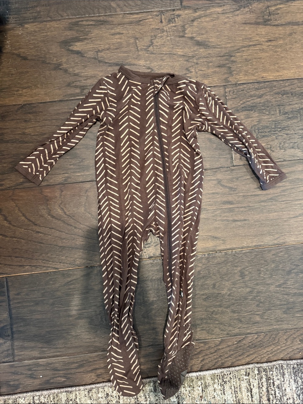 Kyte BABY Brown Arrow-Print Footed One-Piece